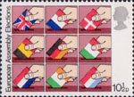 Direct Elections to European Assembly 10.5p Stamp (1979) Placing flags of member nations into ballot boxes