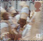 Carnival 43p Stamp (1998) Group of Children in White and Gold Robes